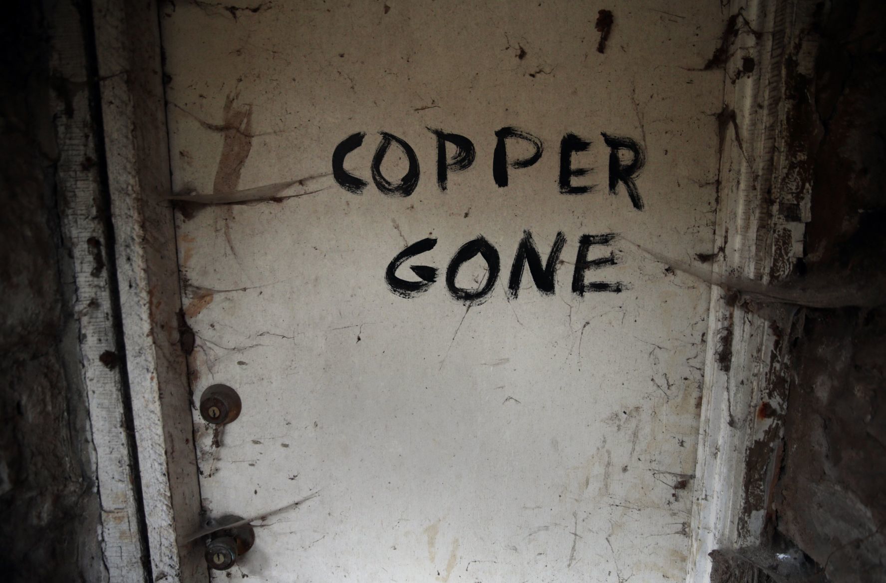 Police officers team with city code enforcers to stabilize vacant buildings